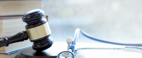 A gavel and stethoscope representing the relationship between CMS and the pharmaceutical industry and ongoing IRA updates and negotiations between the two.